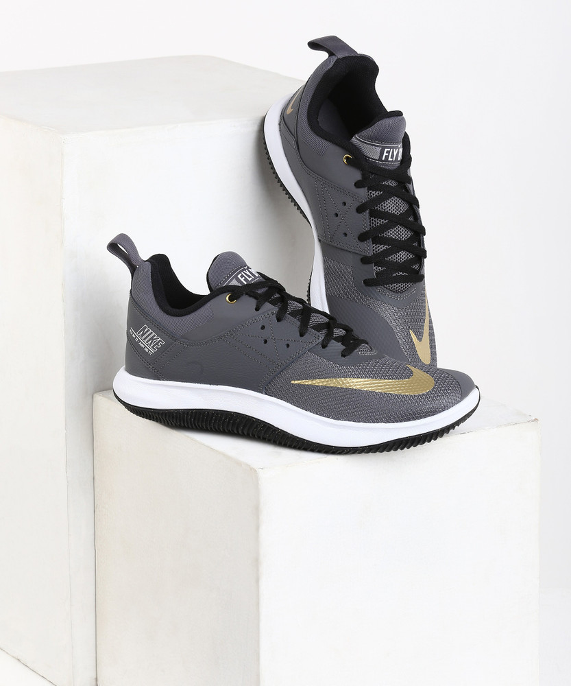 nike flyby low black and gold
